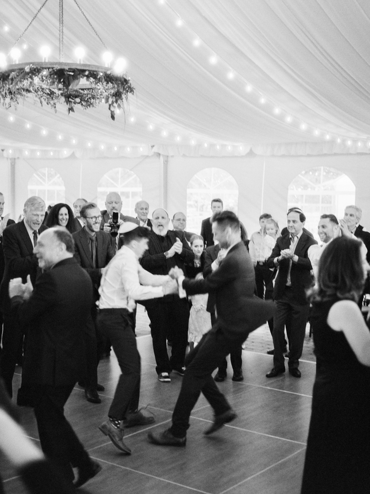 Guests dance at the reception.