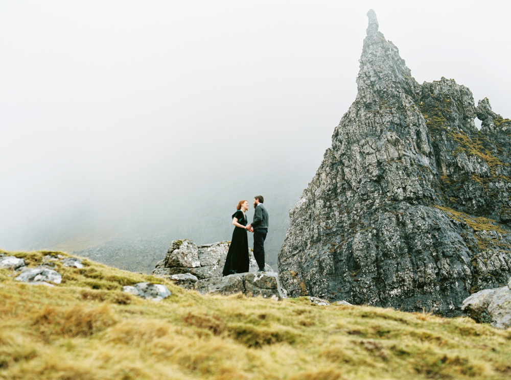 A couple hold hands during their Isle of Skye elopement.