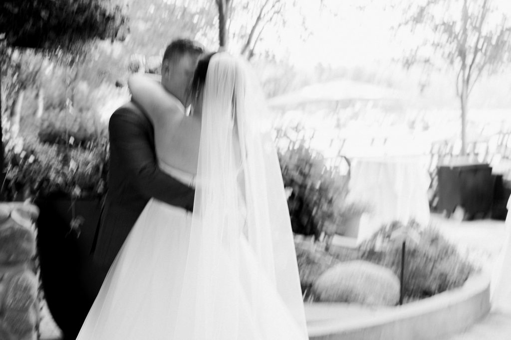 Bride and groom kiss at the Shore Lodge McCall wedding. 
